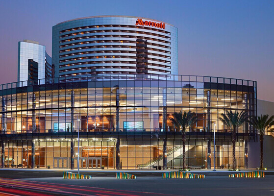 Exterior night view of the Marriott Marquis San Diego hotel