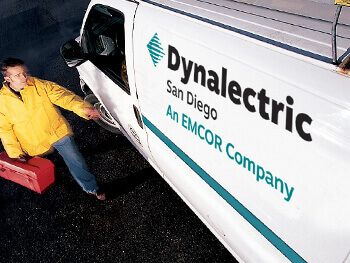 Dynalectric staff member getting into a work vehicle